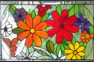 Stained Glass with orange and red flowers